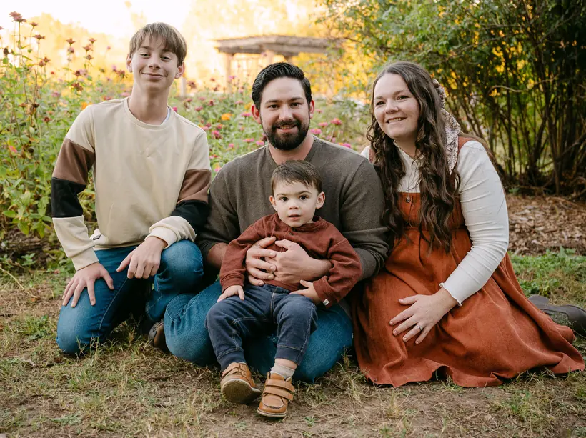 Nathan Collins with his family outside Valley Center, Kansas